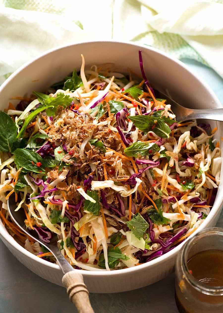 Asian Slaw in a salad bowl with Asian Dressing, ready to be served