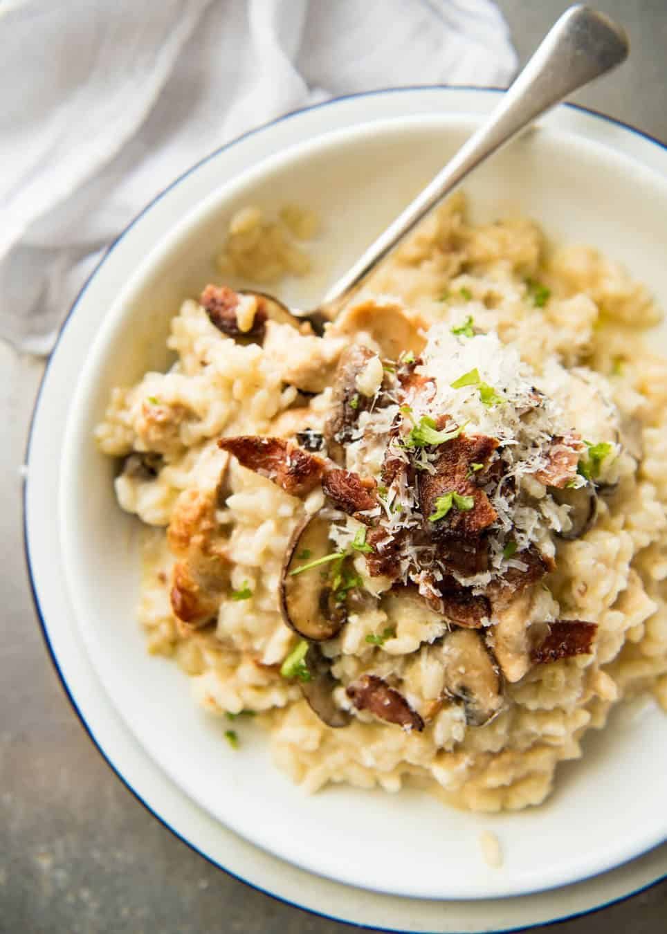 Chicken and Mushroom Risotto - Creamy risotto with golden brown sautéed mushrooms and chicken. Easy, perfectly seasoned and beautifully creamy! www.recipetineats.com
