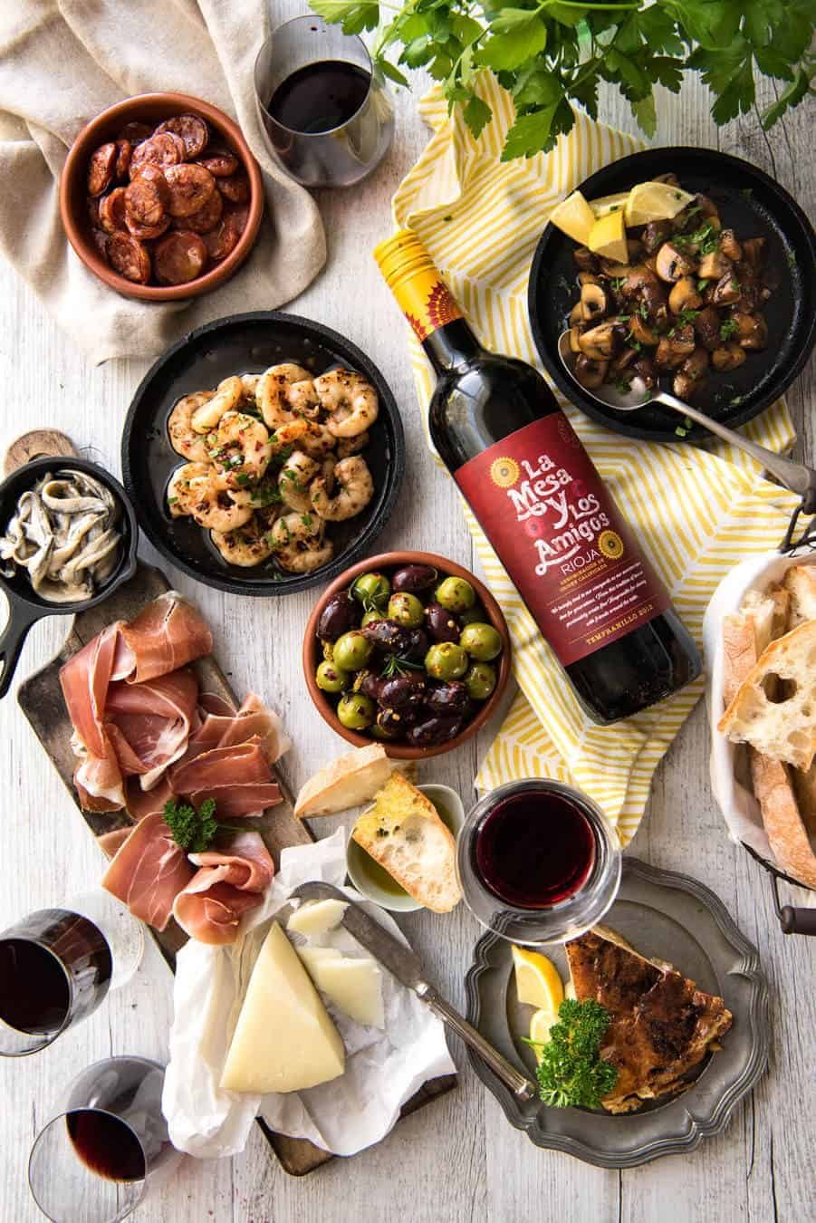 5 Easy Spanish Tapas recipes - all your favorites from the tapas bar! Garlic mushrooms, chorizo, garlic shrimp/prawns, Spanish marinated olives , Spanish omelette and a cheese platter! recipetineats.com