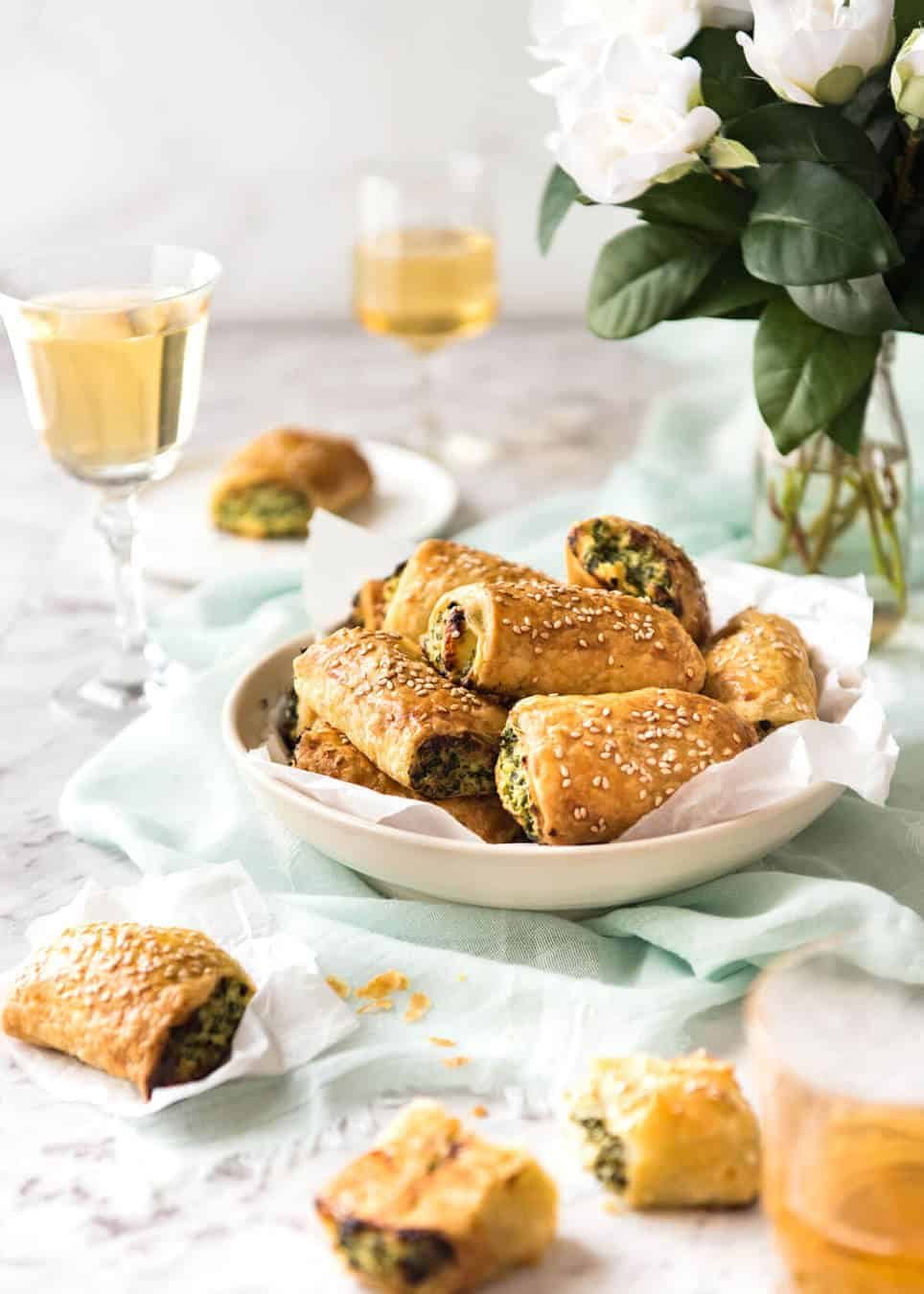 Spinach and Ricotta Rolls - a moist cheesy filling enclosed with buttery flaky puff pastry. Great make ahead for freezing! www.recipetineats.com