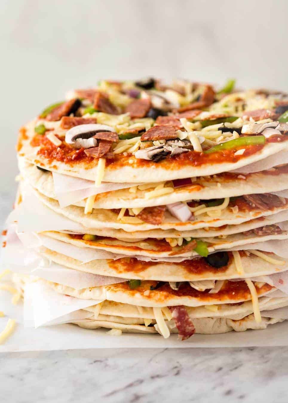 $2 Homemade Frozen Pizzas - quick and easy made using flatbreads, cook from frozen for a terrific Thin & Crispy pizza! www.recipetineats.com