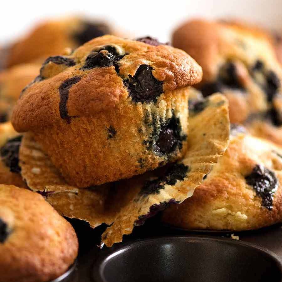 Close up of freshly cooked Blueberry Muffins in muffin tins
