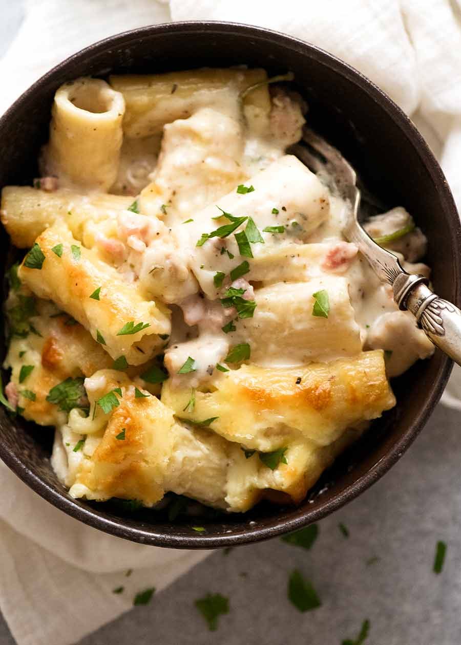 Rigatoni creamy pasta bake in a bowl, ready to be eaten