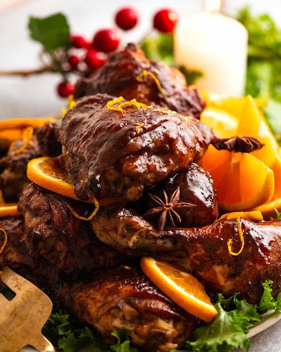 Close up of pile of Sticky Glazed Christmas Chicken