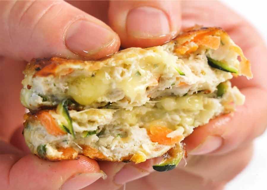 Showing cheesy pockets inside Chicken rissoles (chicken patties)