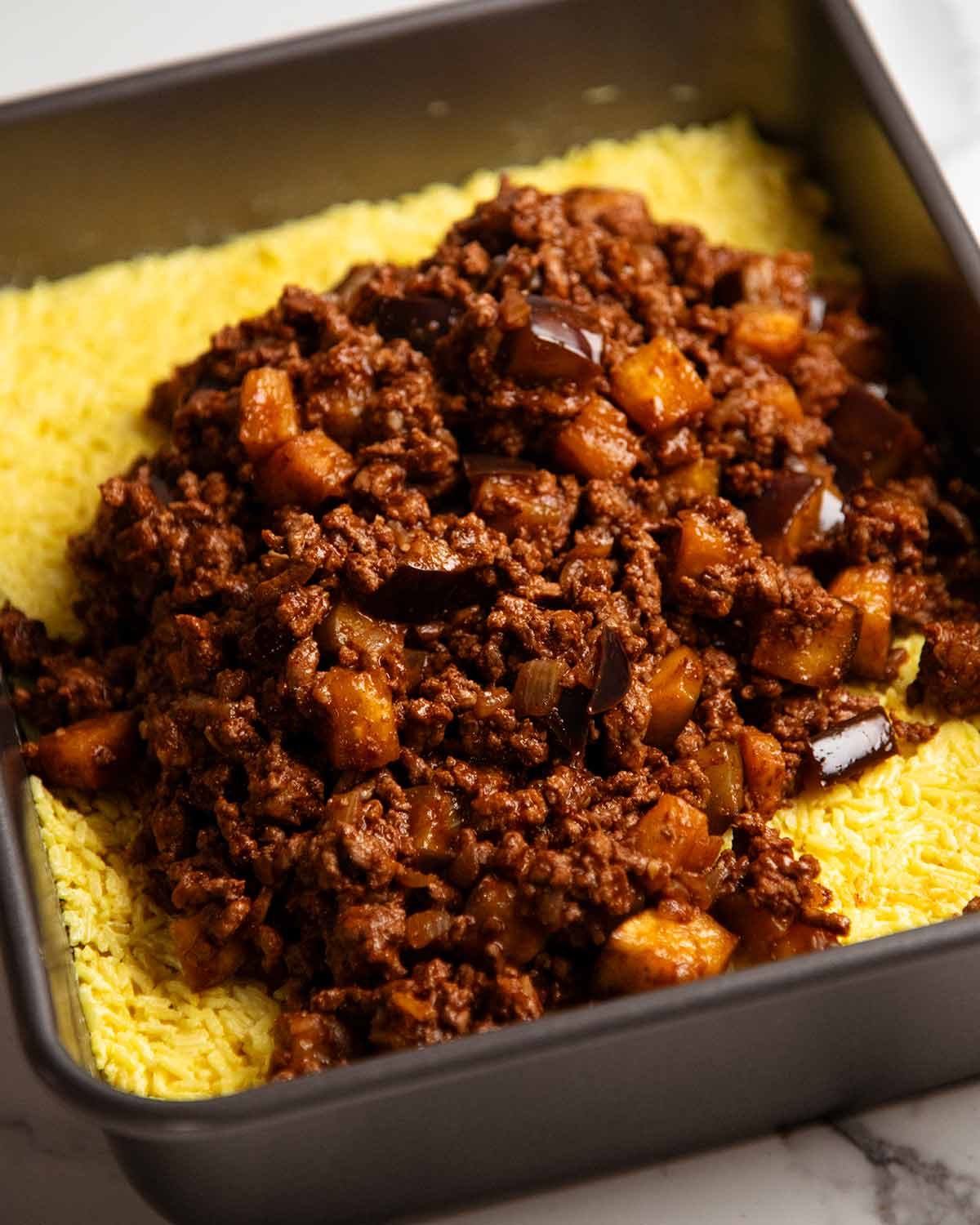 Golden Saffron Rice Bake stuffed with Spiced Meat